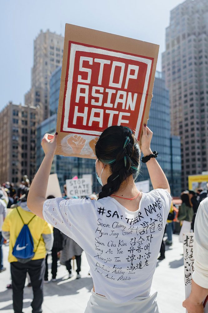 Woman with Stop Asian Hate Poster at Protest