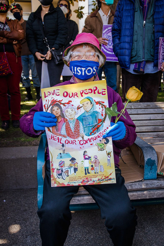 Woman with Stop Asian Hate Poster at Protest